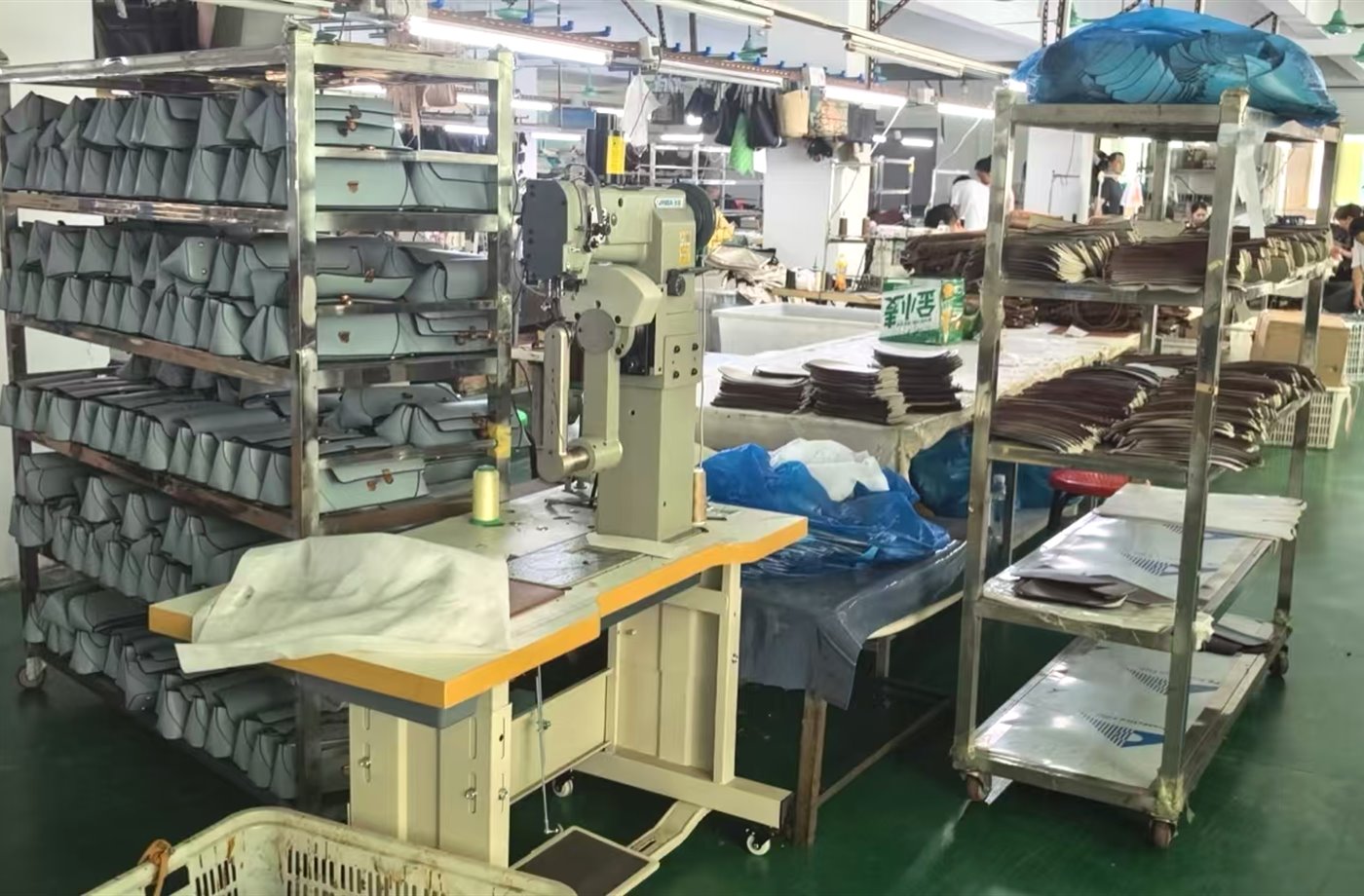 Handbag workshop line with storage racks and work tables