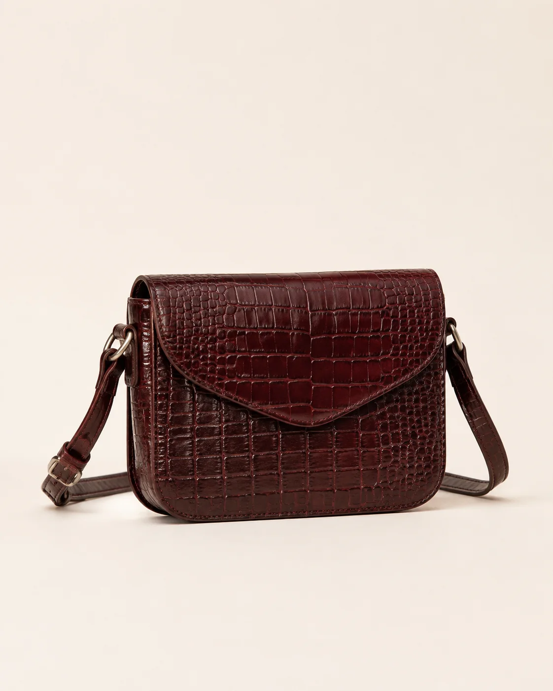 Previous croc-embossed crossbody bag concept for private label development