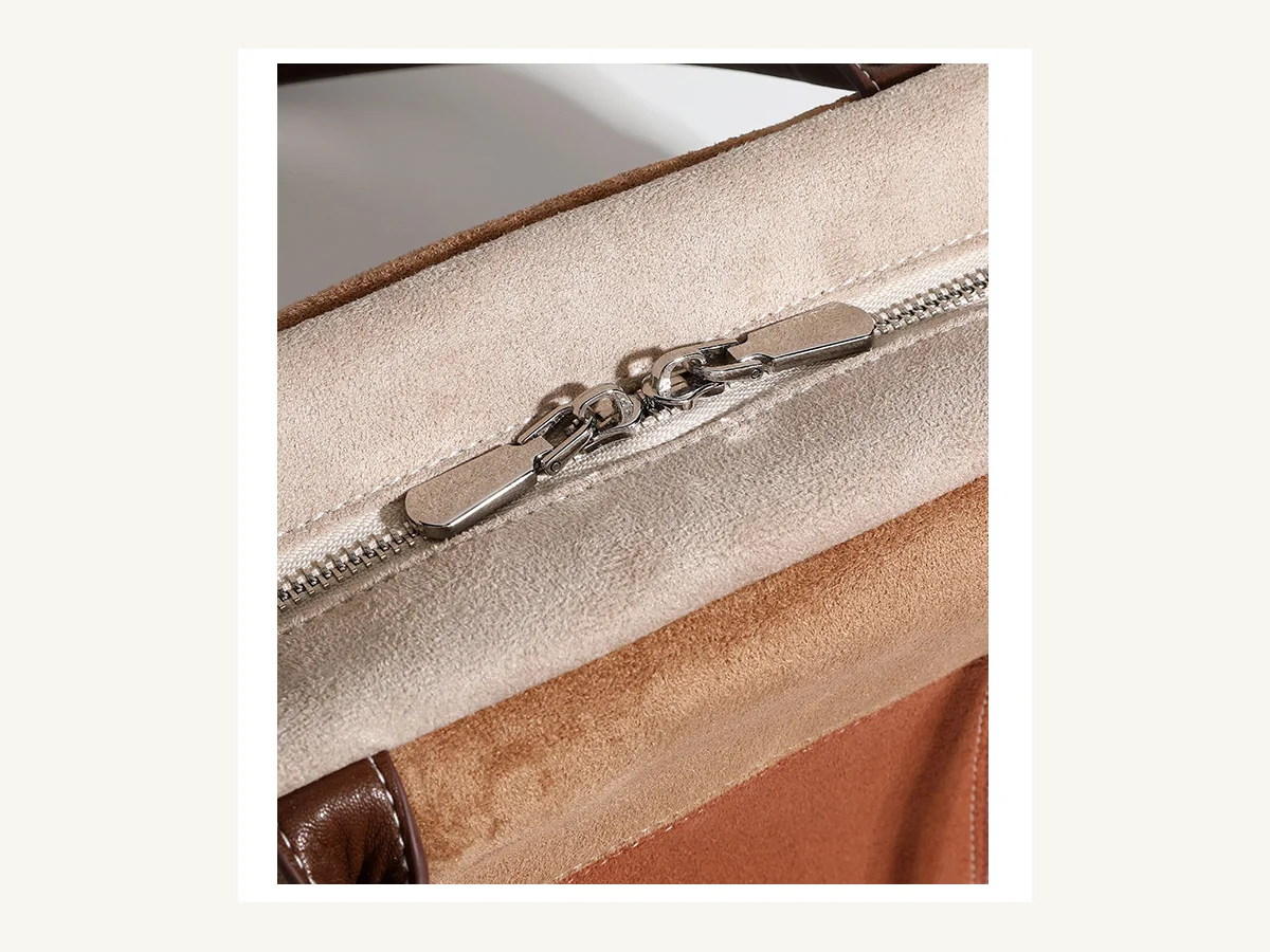 Zipper puller and top construction detail on ZS-9228 handbag
